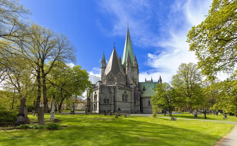 Nidaros Cathedral in Trondheim, surrounded by trees